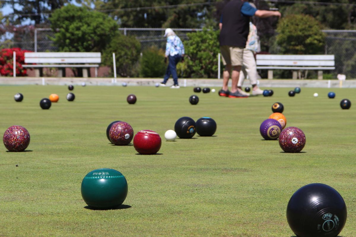 close up of a field full of lawn bowls