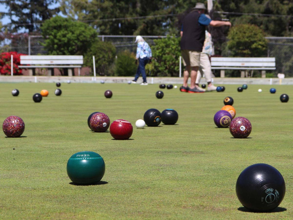 close up of a field full of lawn bowls